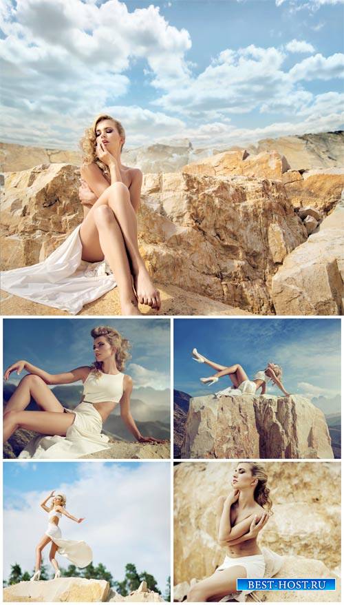Светловолосая девушка на скале / Blonde girl on the rock - Stock Photo