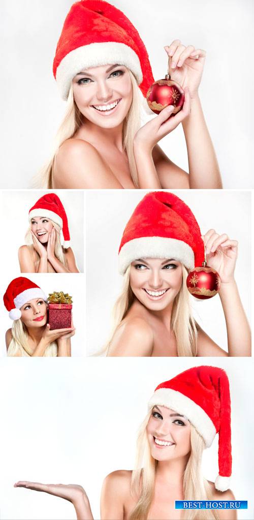 Beautiful blonde girl in santa hat - Christmas stock photos