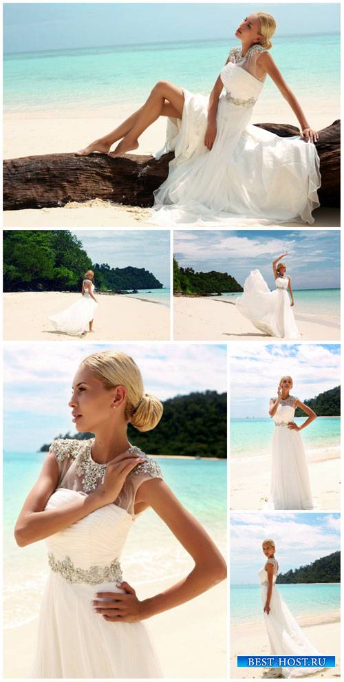 Bride on the beach - wedding stock photos