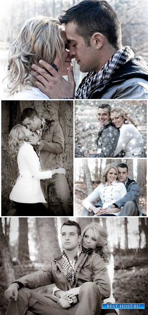 Loving couple in the winter forest - Stock Photo
