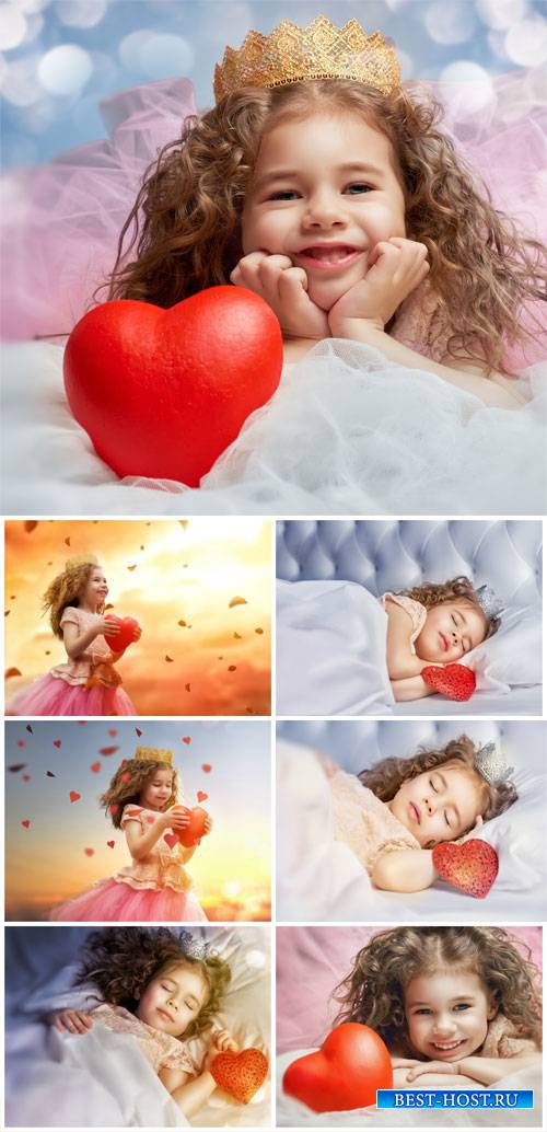 Little girl with heart - stock photos