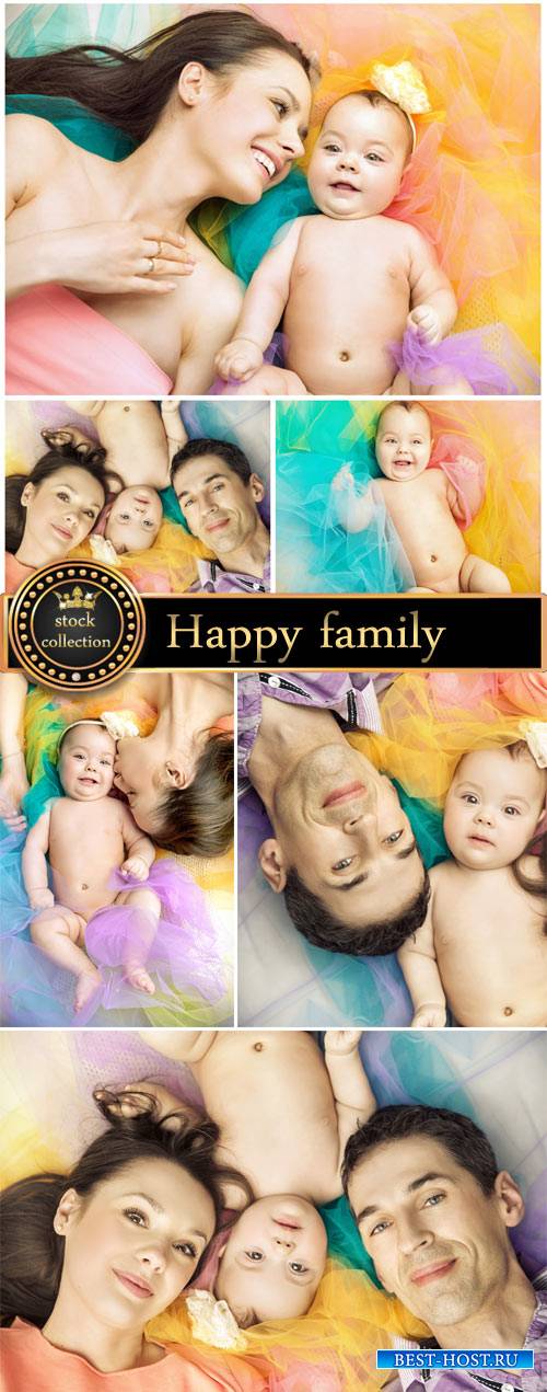 Happy couple with a baby - Stock Photo