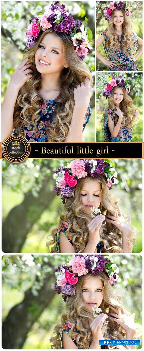 Beautiful little girl in a wreath - Stock photo