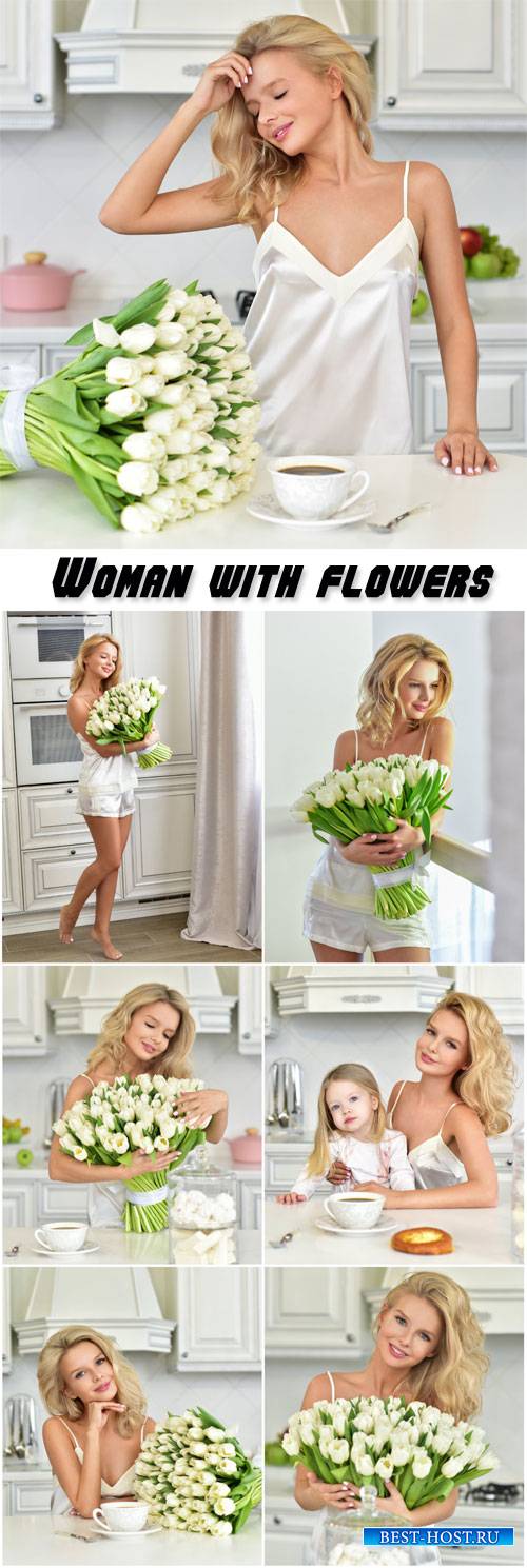 Beautiful young mother with a bouquet of roses