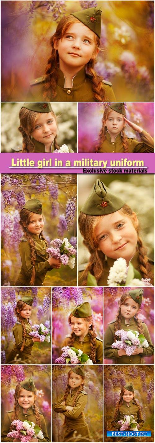 Cute little girl in a military uniform