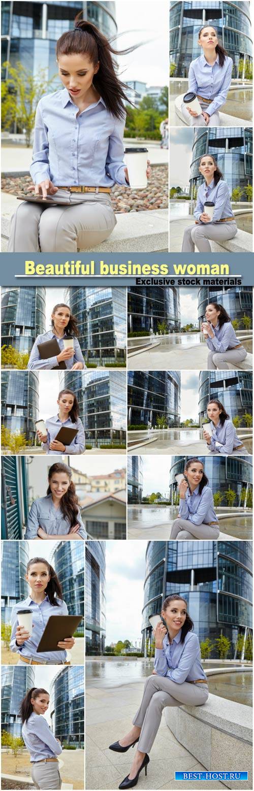 Beautiful business woman on the background of the modern office