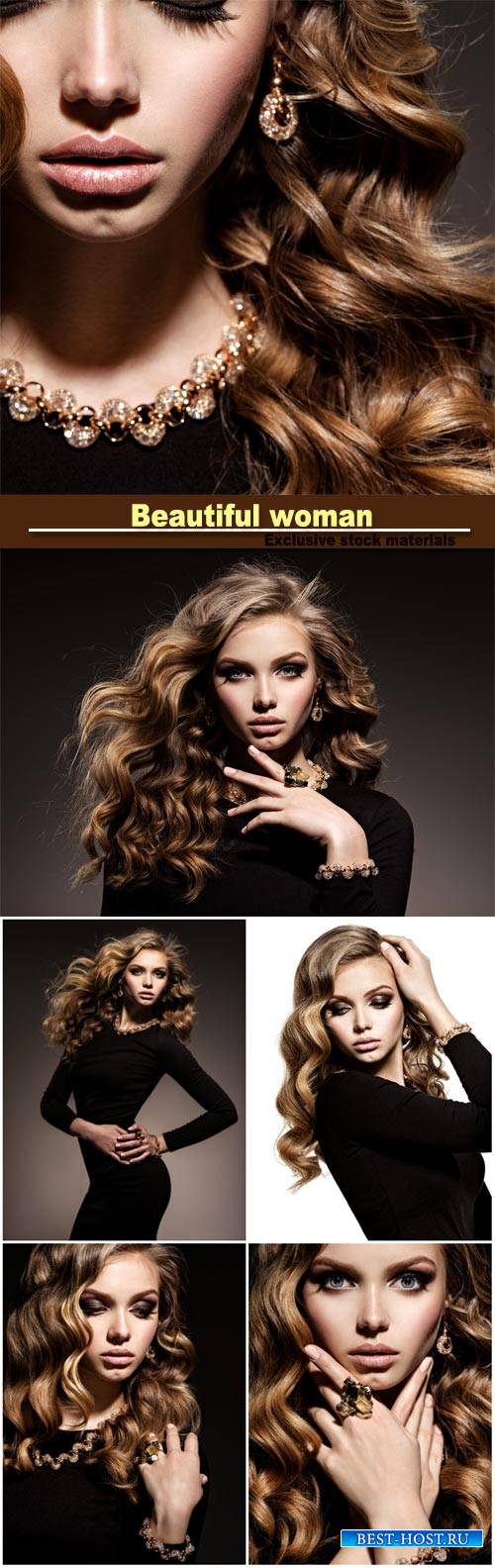 Gorgeous young girl with wavy hair and trendy makeup, beautiful gold jewelry