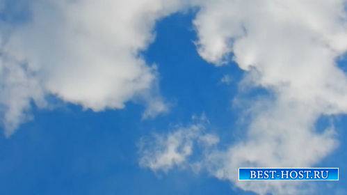 Футаж -  Белые облака на синем небе