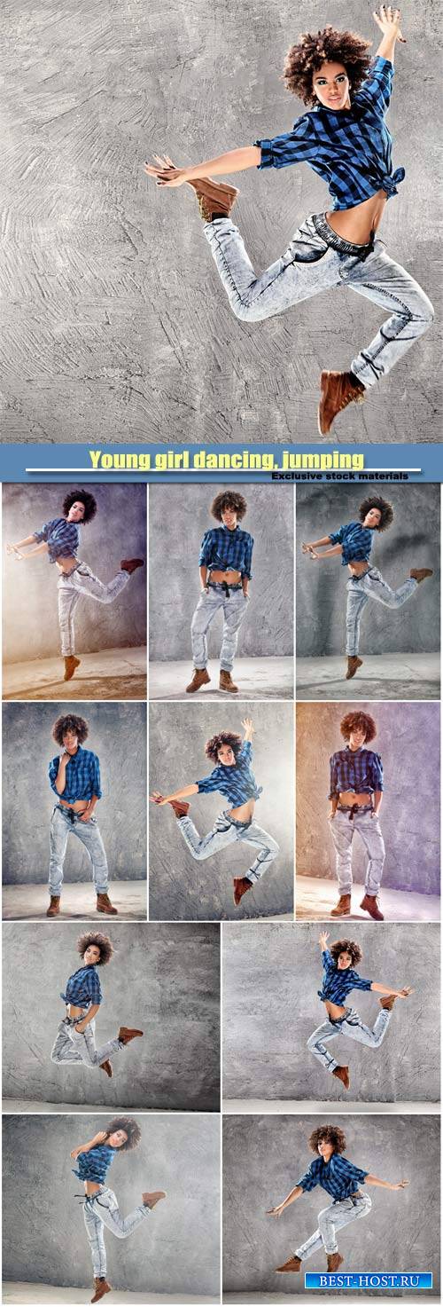 Young girl dancing, jumping