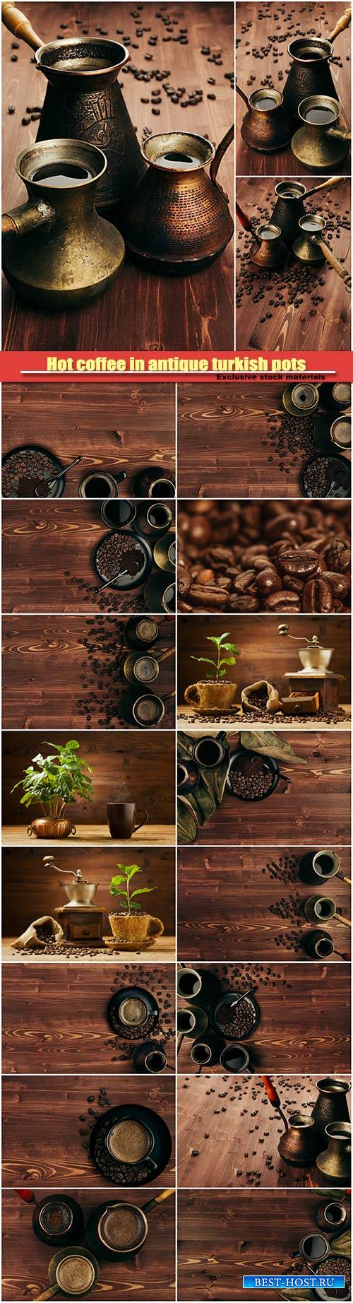 Hot coffee in antique turkish pots, beans on brown old wooden board backgro ...