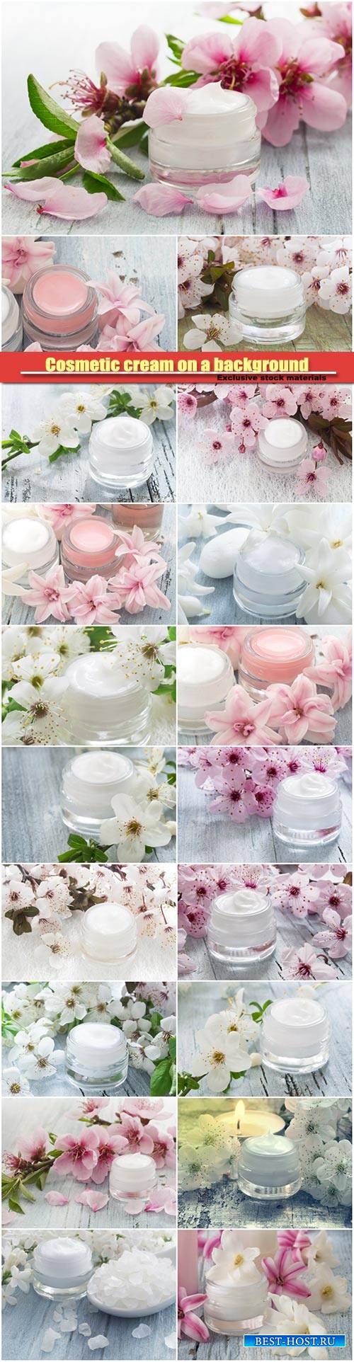 Cosmetic cream on a background of spring flowers