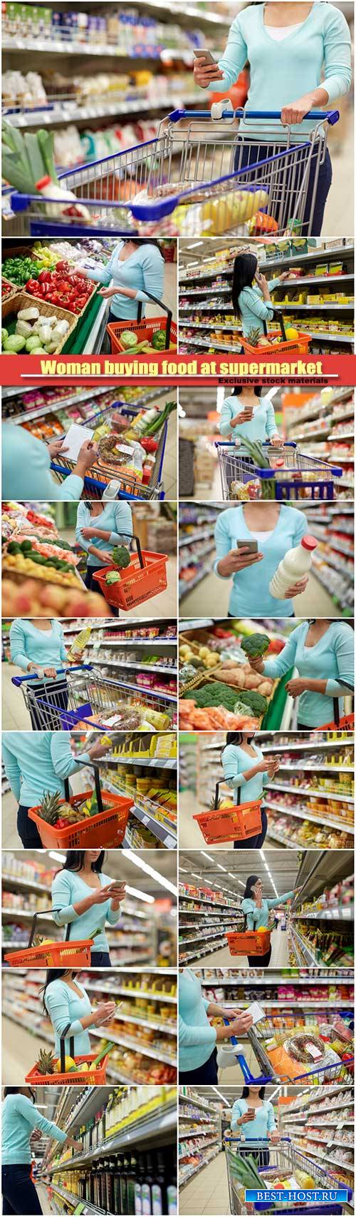 Woman buying food at supermarket