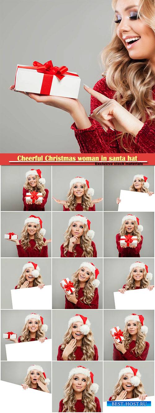 Cheerful Christmas woman in santa hat with white banner background