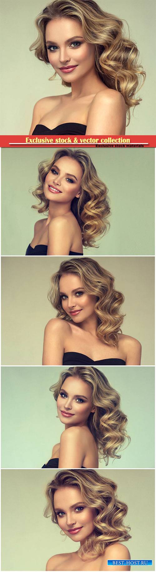 Pretty blond-haired model with middle length curly, loose hairstyle and att ...