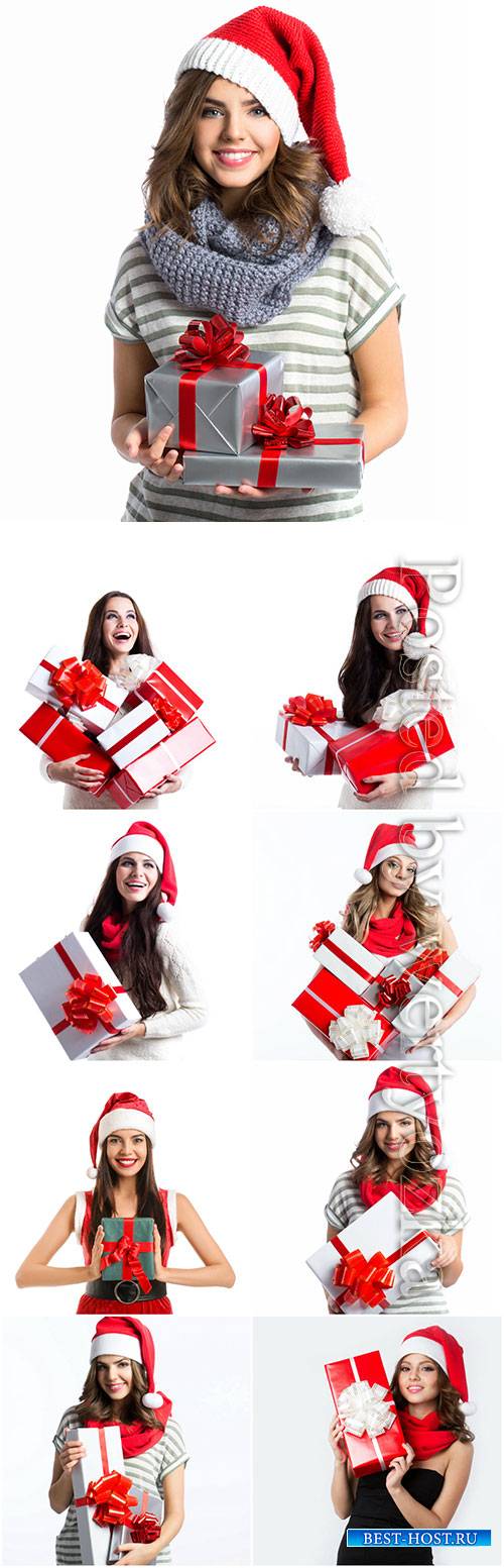 Girls in santa costume with gifts