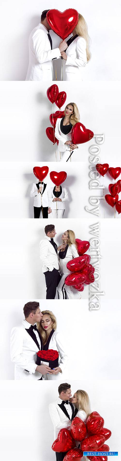 Loving couple with balloons from hearts